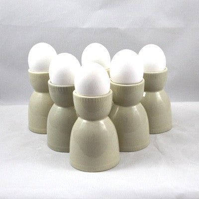 Unusual brown vintage double egg cup with double boiled egg holder